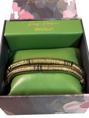 Paige Harper ribbed metal stretch bracelets
Gold tone
NEW